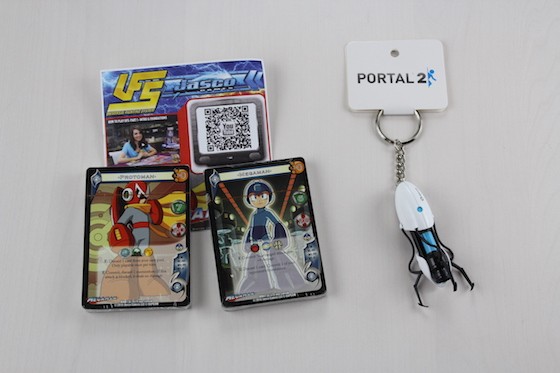 Comic Con Box Subscription Box Review - July 2015 - Portal 2 Keychain and UFS Card Game