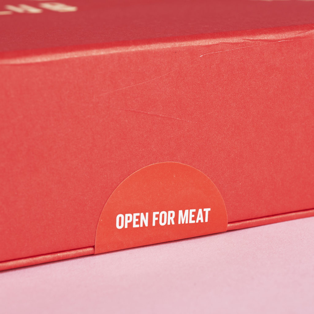 "Open for Meat" sticker on the interior box