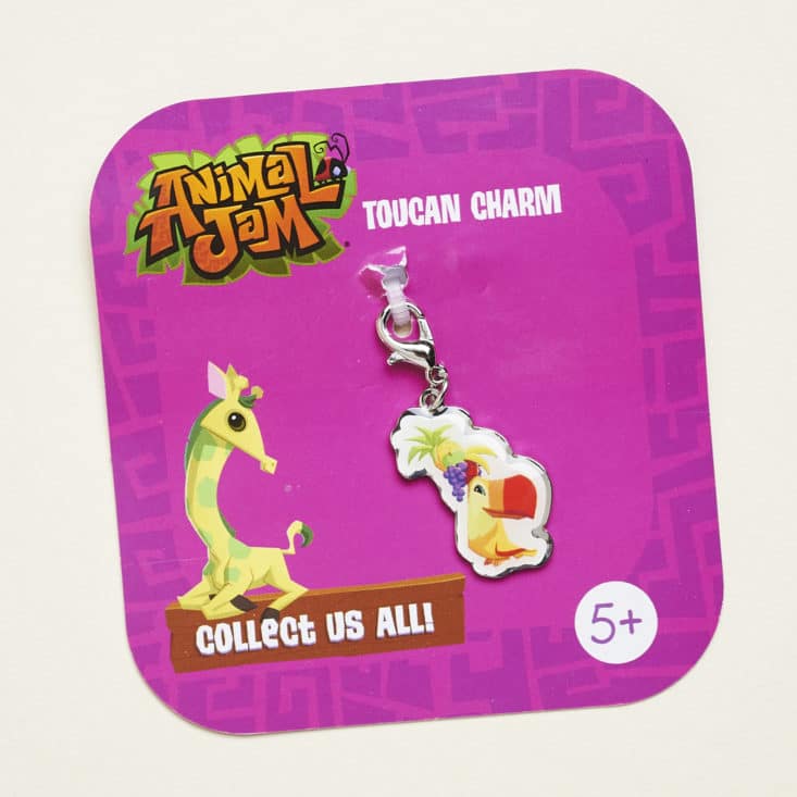 Animal Jam May 2017 Subscription Box: Toucan charm on backing cardboard