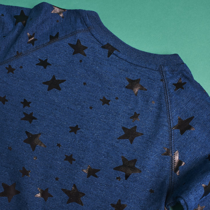 Detail of blue sweatshirt with a star print from Little Starters, size 3T