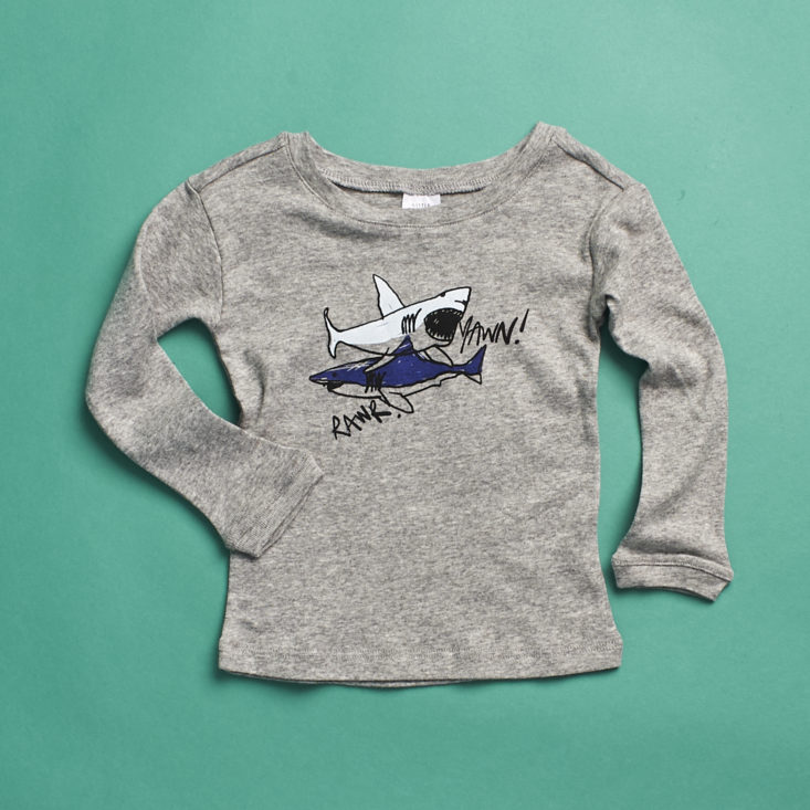 A grey t-shirt with a shark print from Little Starters, size 2T