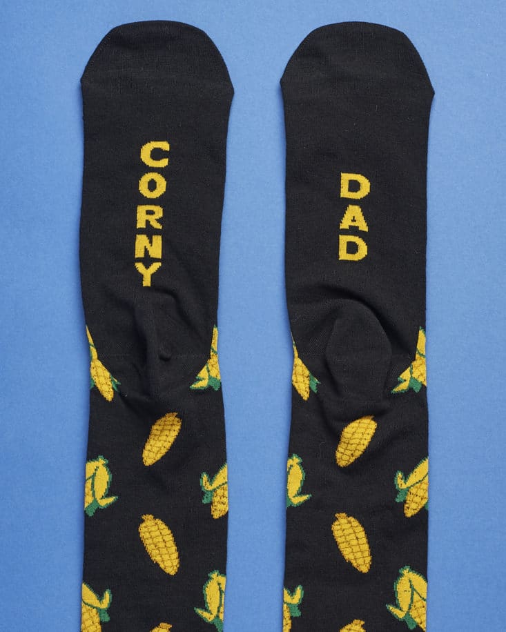 Detail of socks showing Corny Dad printed on the sole