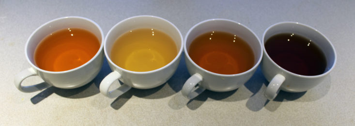 four cups of brewed tea