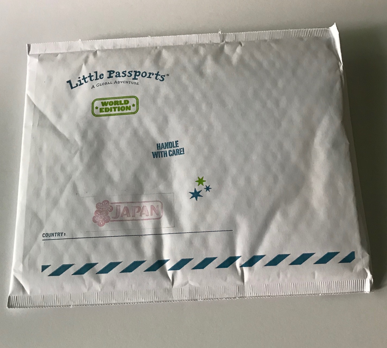 https://blog.mysubscriptionaddiction.com/wp-content/uploads/2018/06/Little-Passports-World-Edition-Subscription-Box-Review-July-2018-1-box.jpg