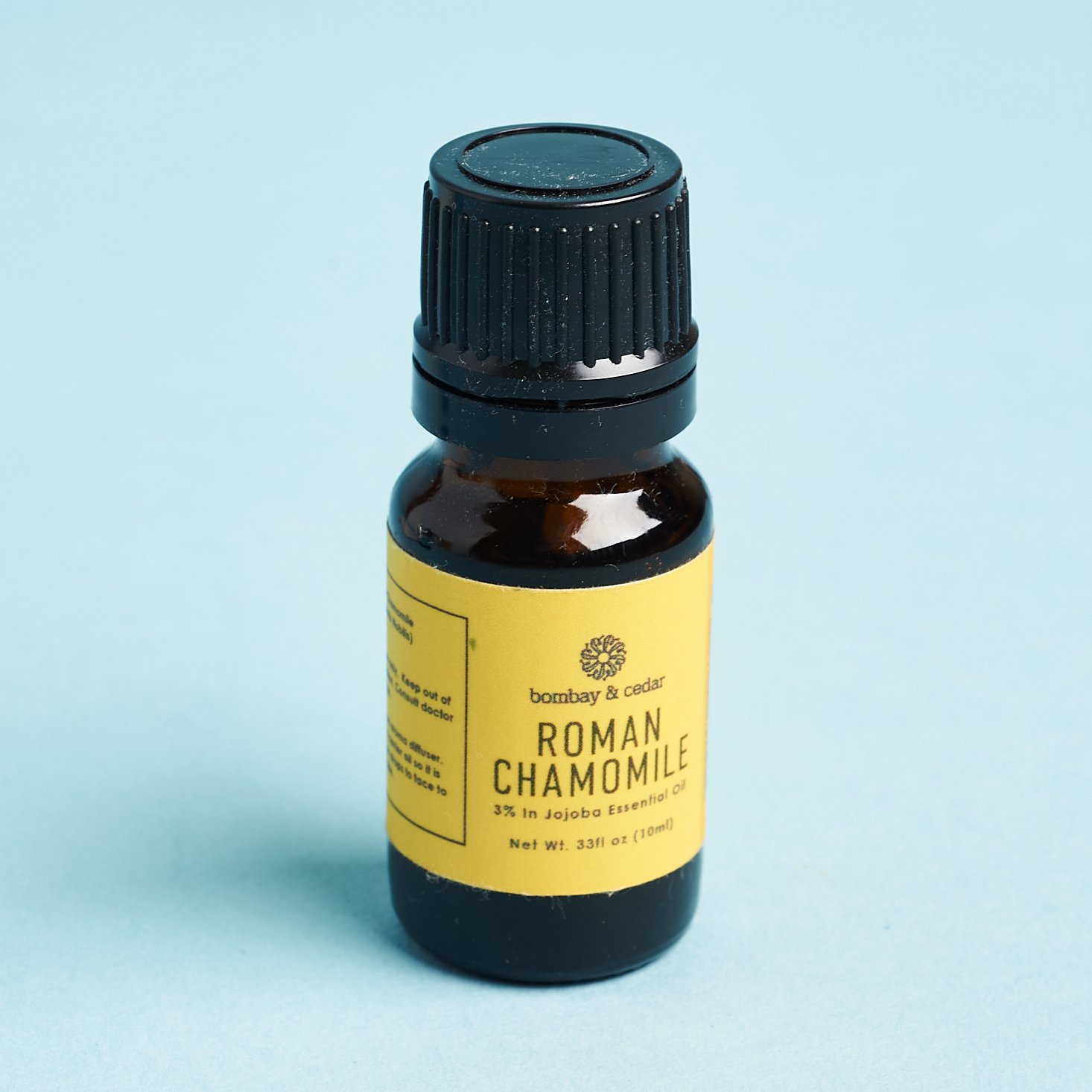 yellow label roman chamomile oil bottle