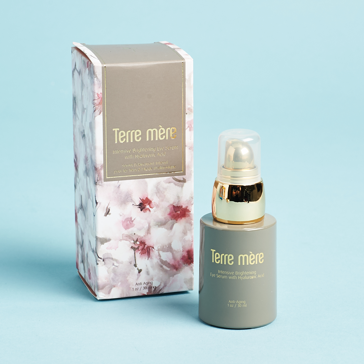 eye serum in grey glass bottle with floral box