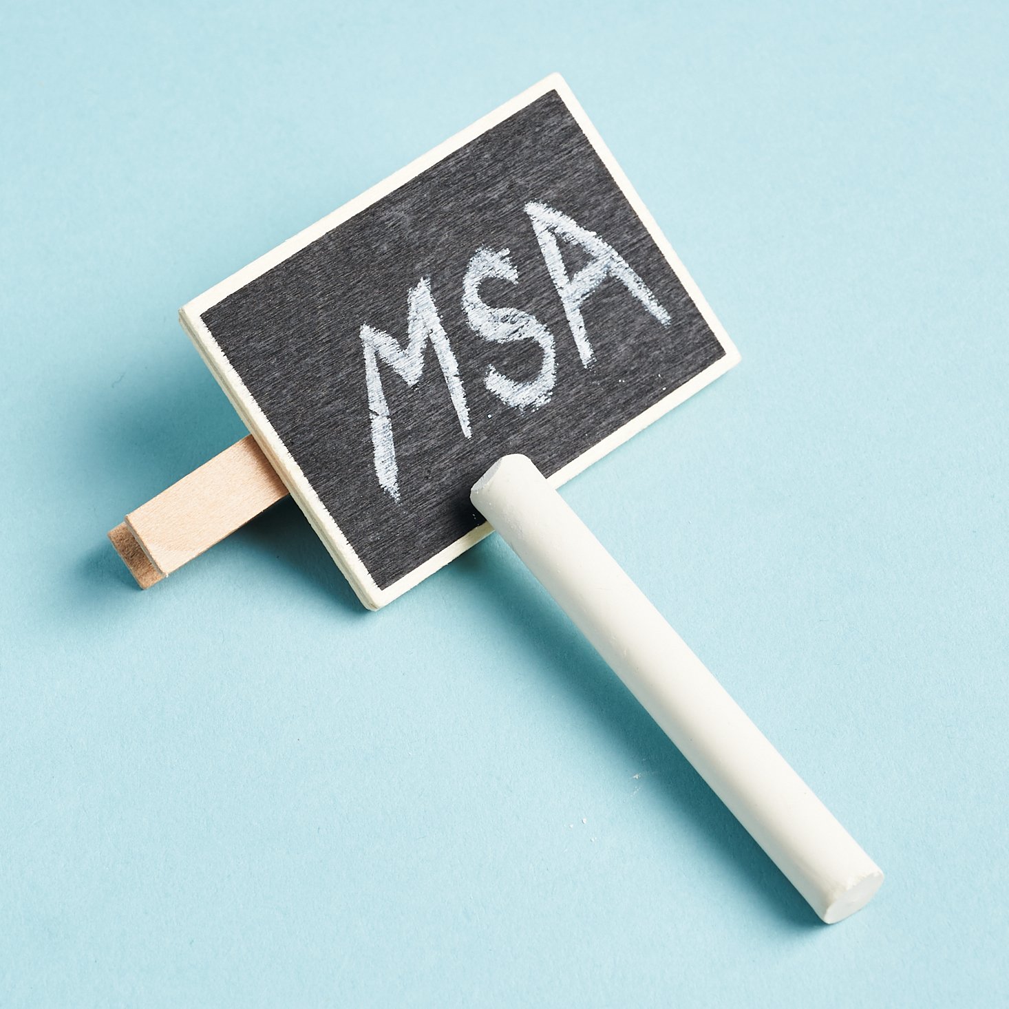 MSA written in white chalk on mini board