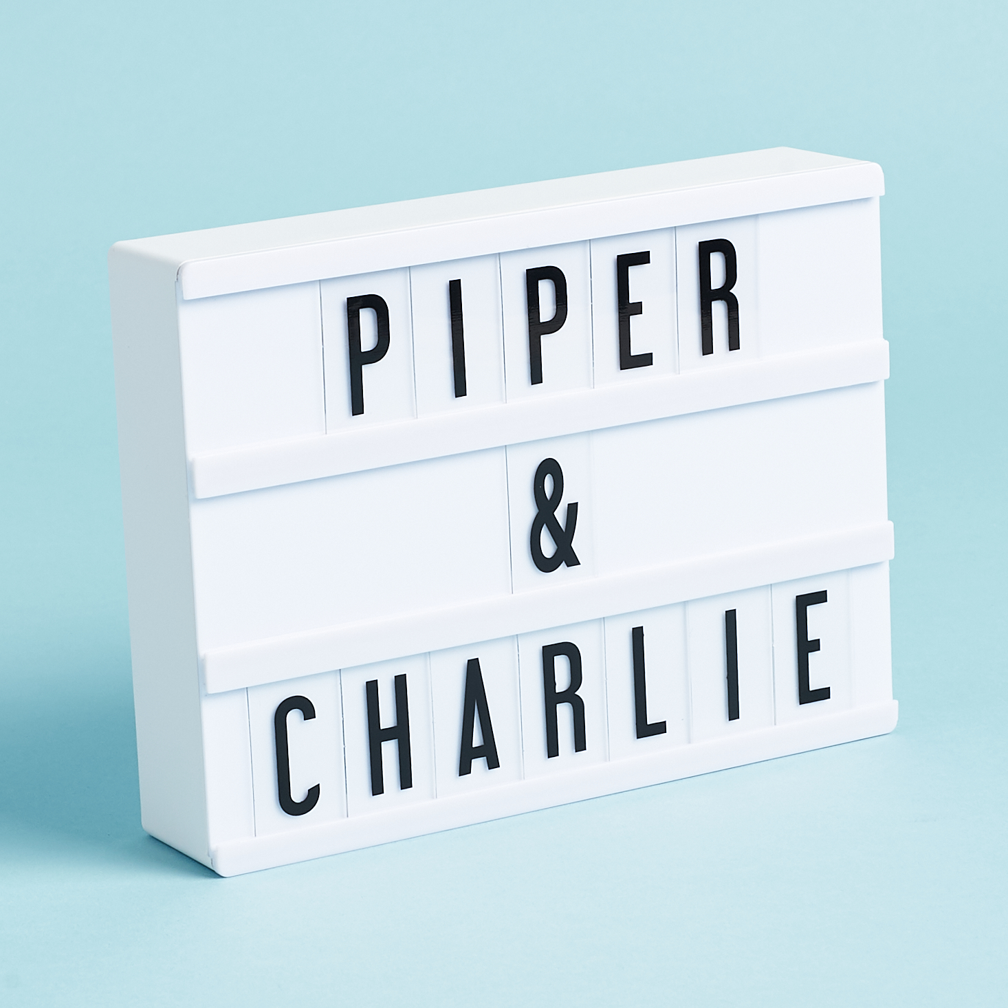 cinema lightboard with piper & charlie spelled out