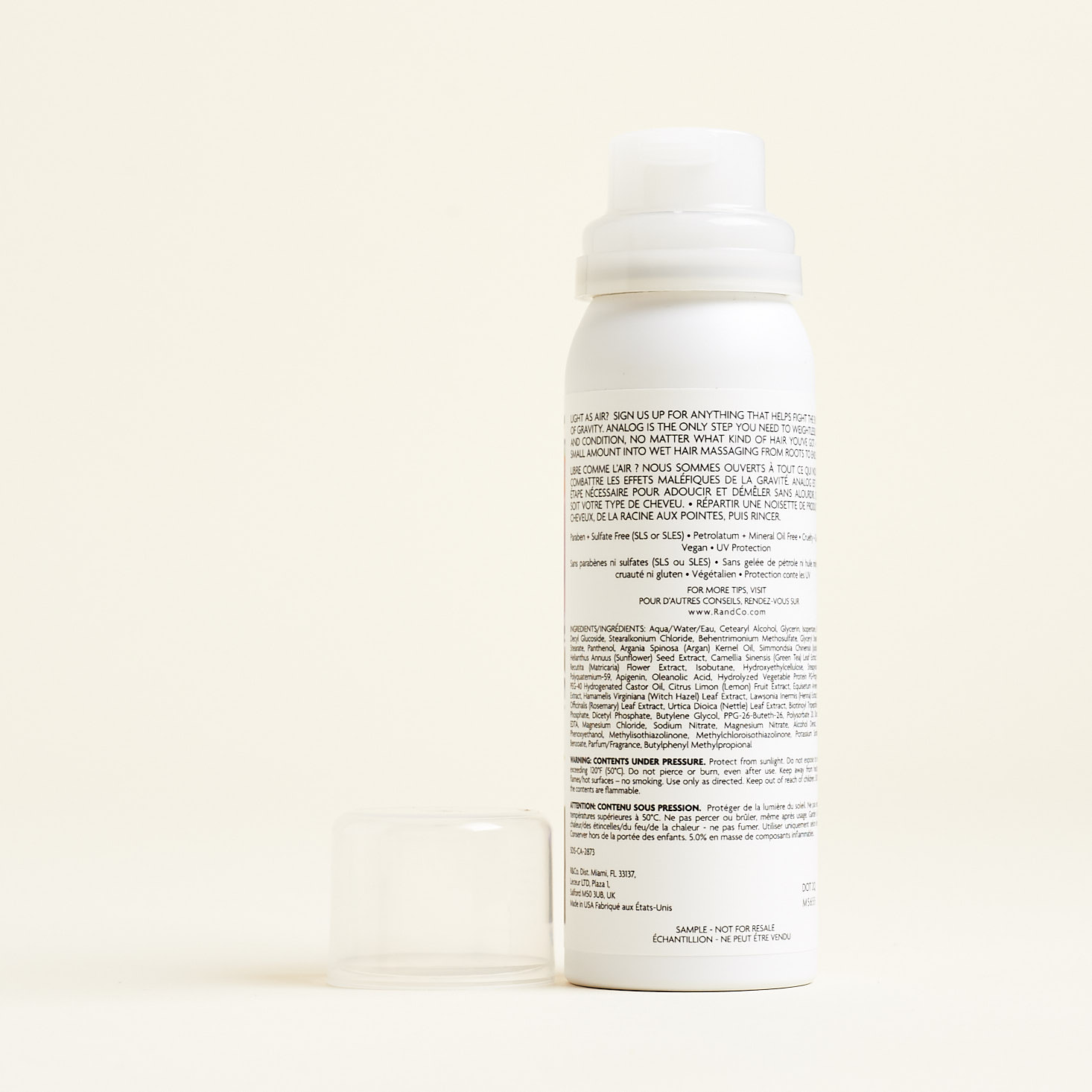 Back of R+Co Analog Cleansing Foam Conditioner with the lid off