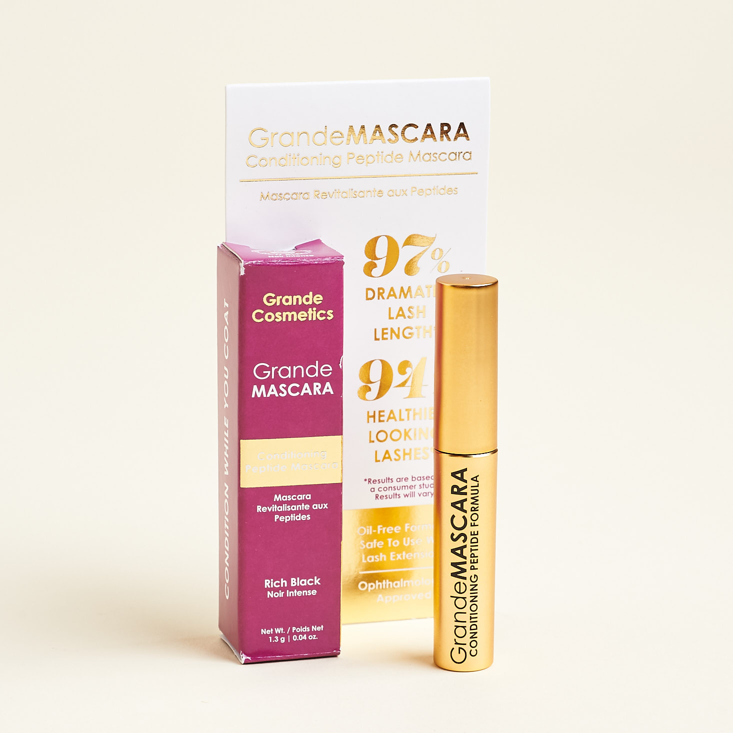 grande mascara in gold tube next to packaging