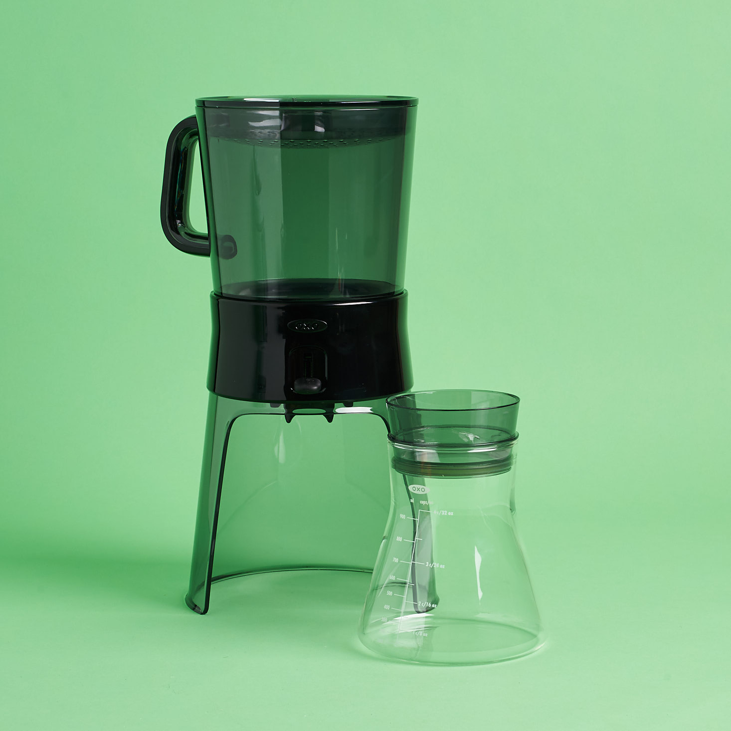 OXO Good Grips Cold Brew Coffee Maker with glass carafe in front