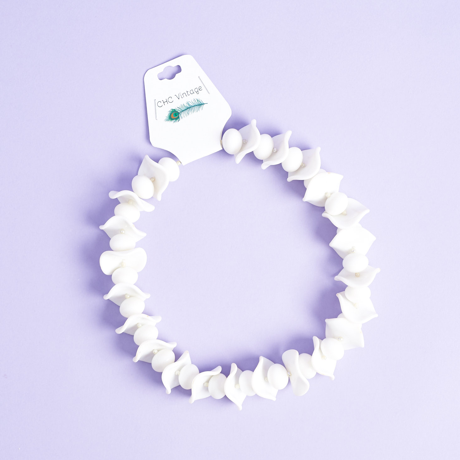 White retro choker necklace with abstract, white, shell-like beads