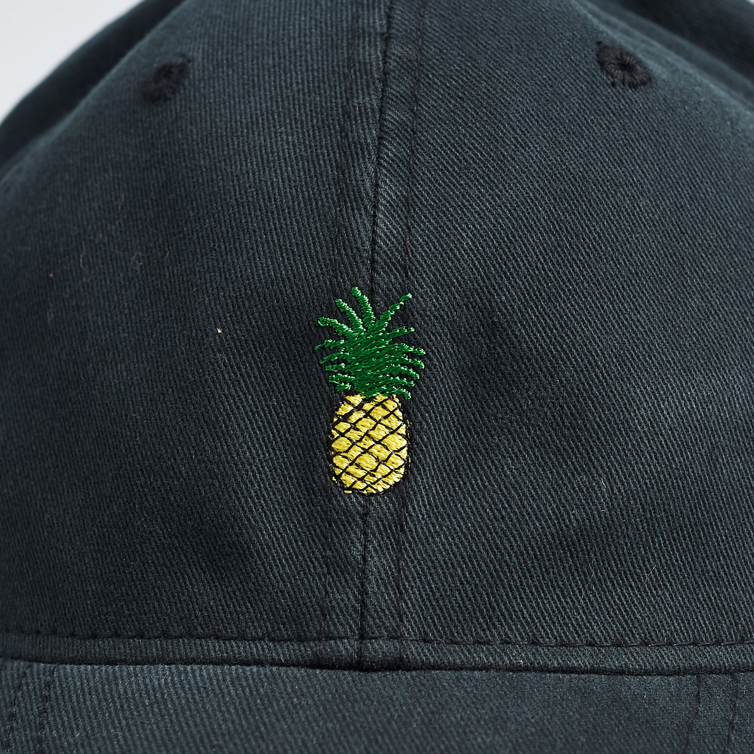 close up of image on Honolua Surf Co Pineapple Baseball Hat