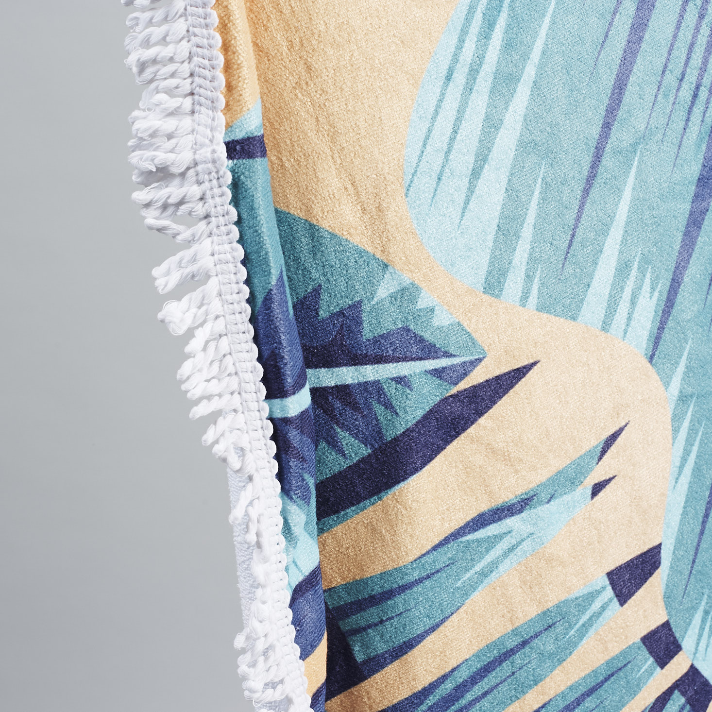 close up of fringe on Slippa Round Palm Towel