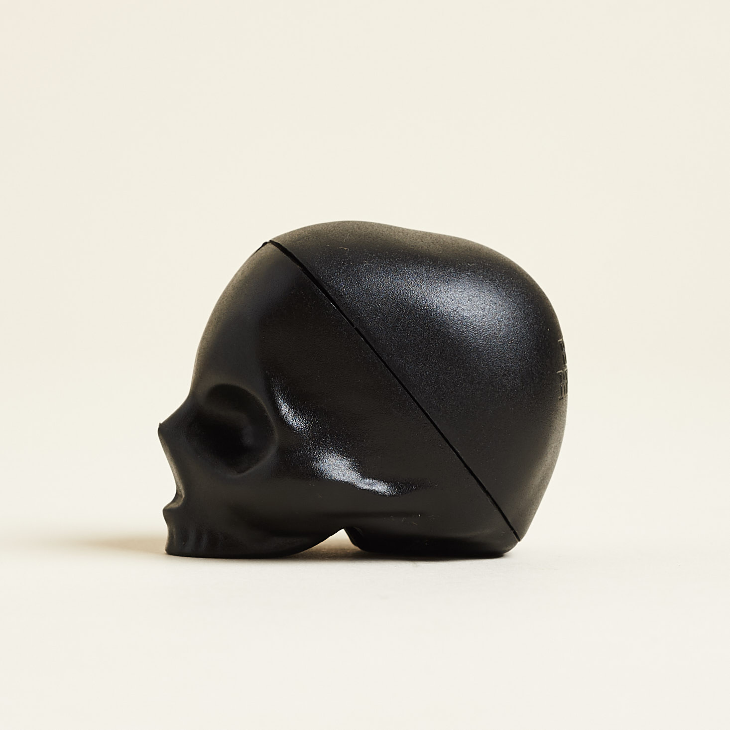 side of black plastic skull