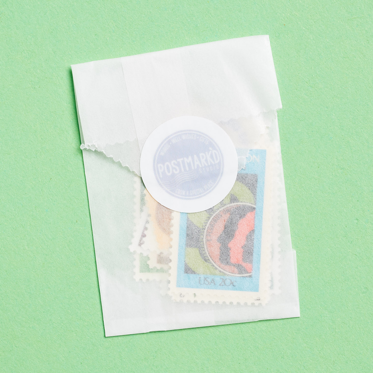 stamps in vellum envelope