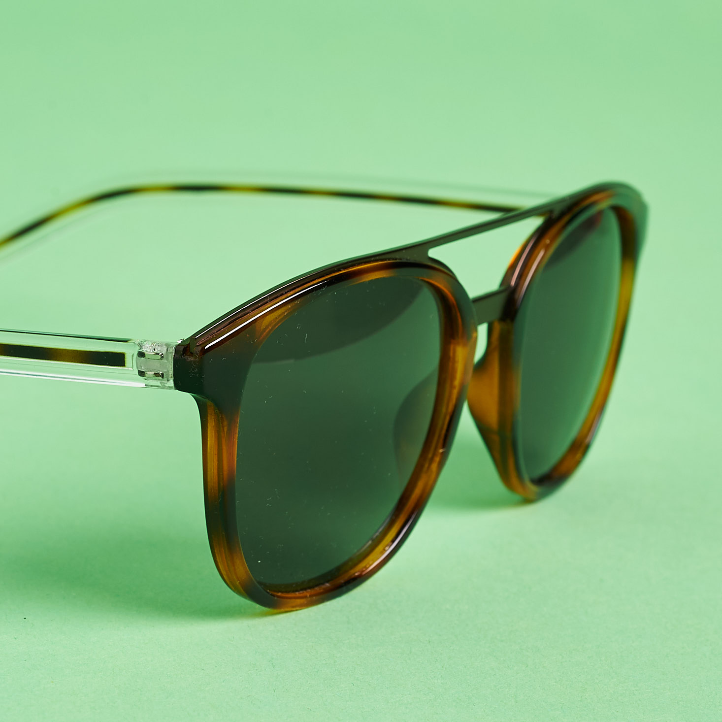 close up of Shades Club tortoise sunglasses