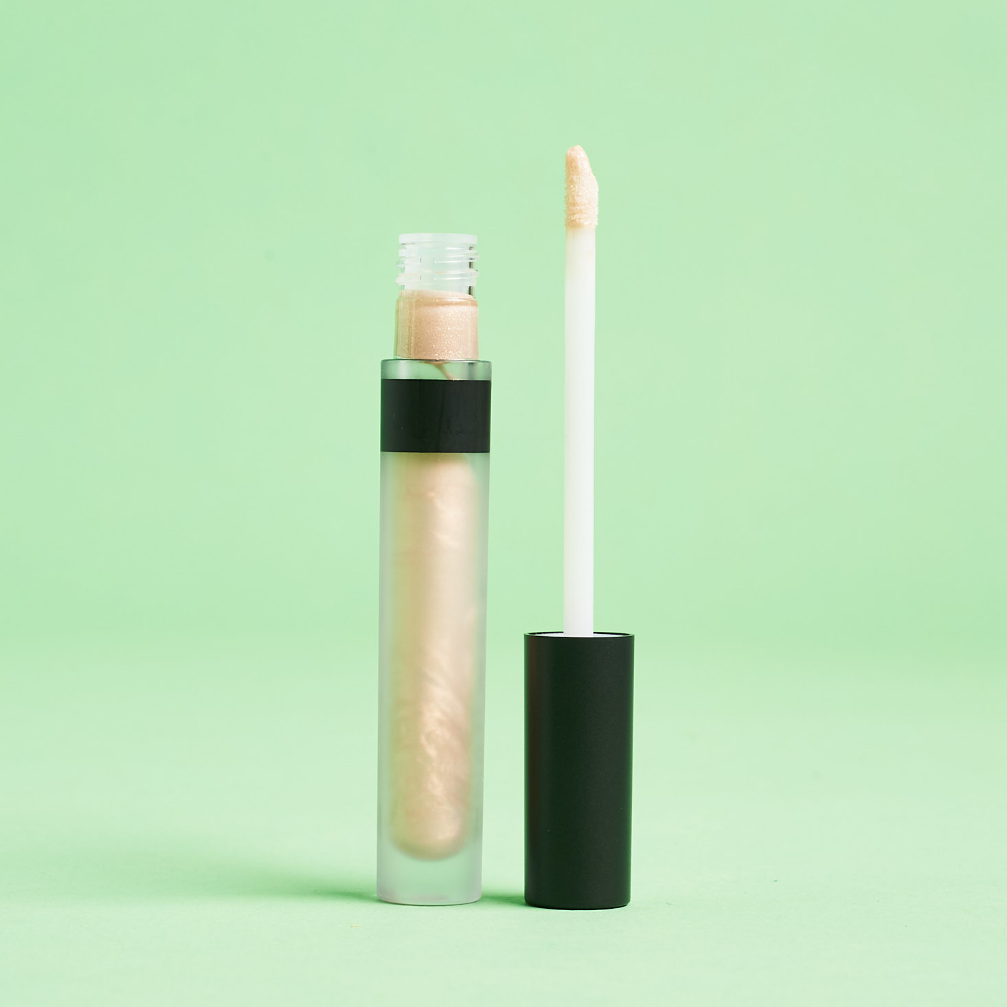 opened AU NATURALE X SWITCH2PURE HIGH LUSTRE LIP GLOSS in glow on
