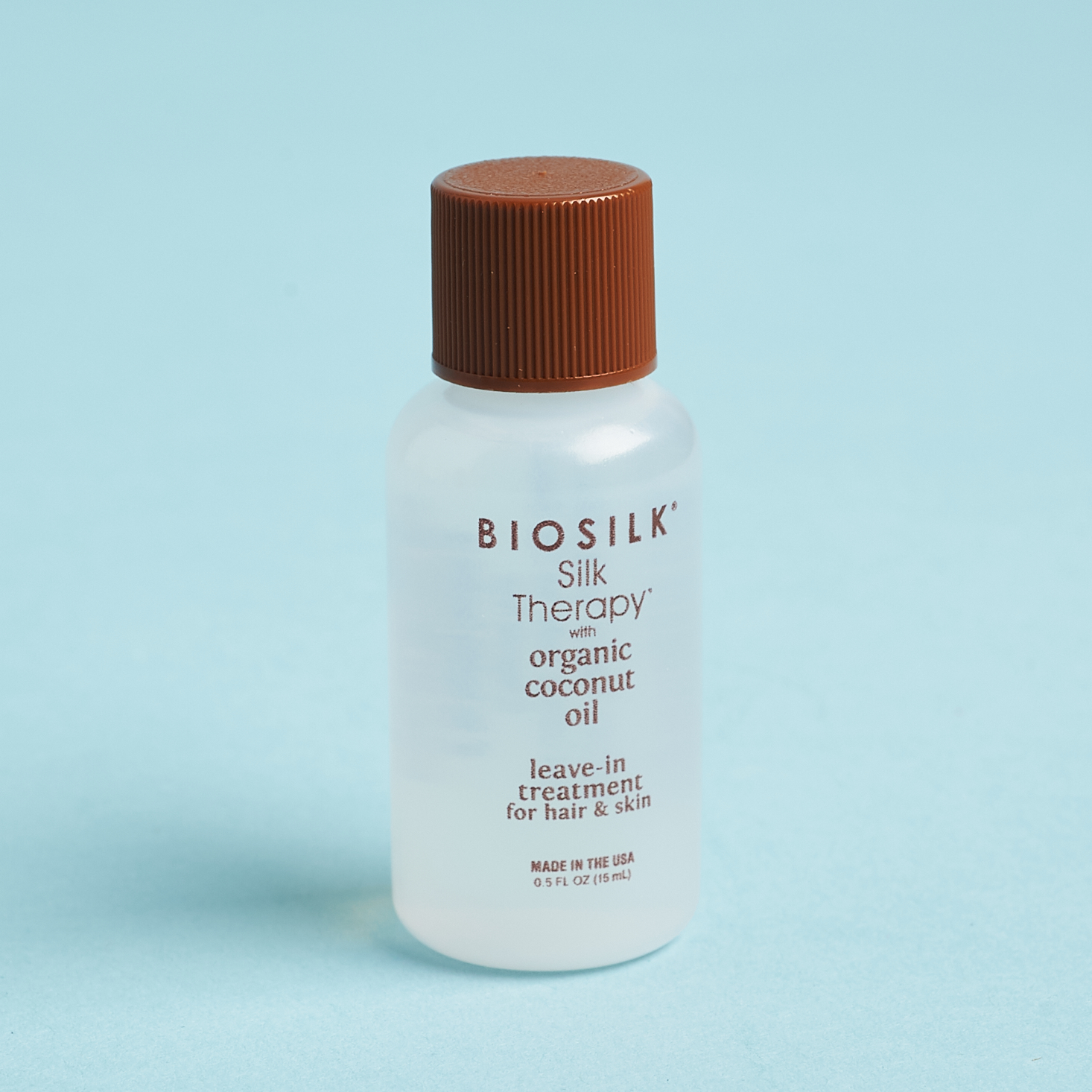 clear bottle of biosilk with brown cap