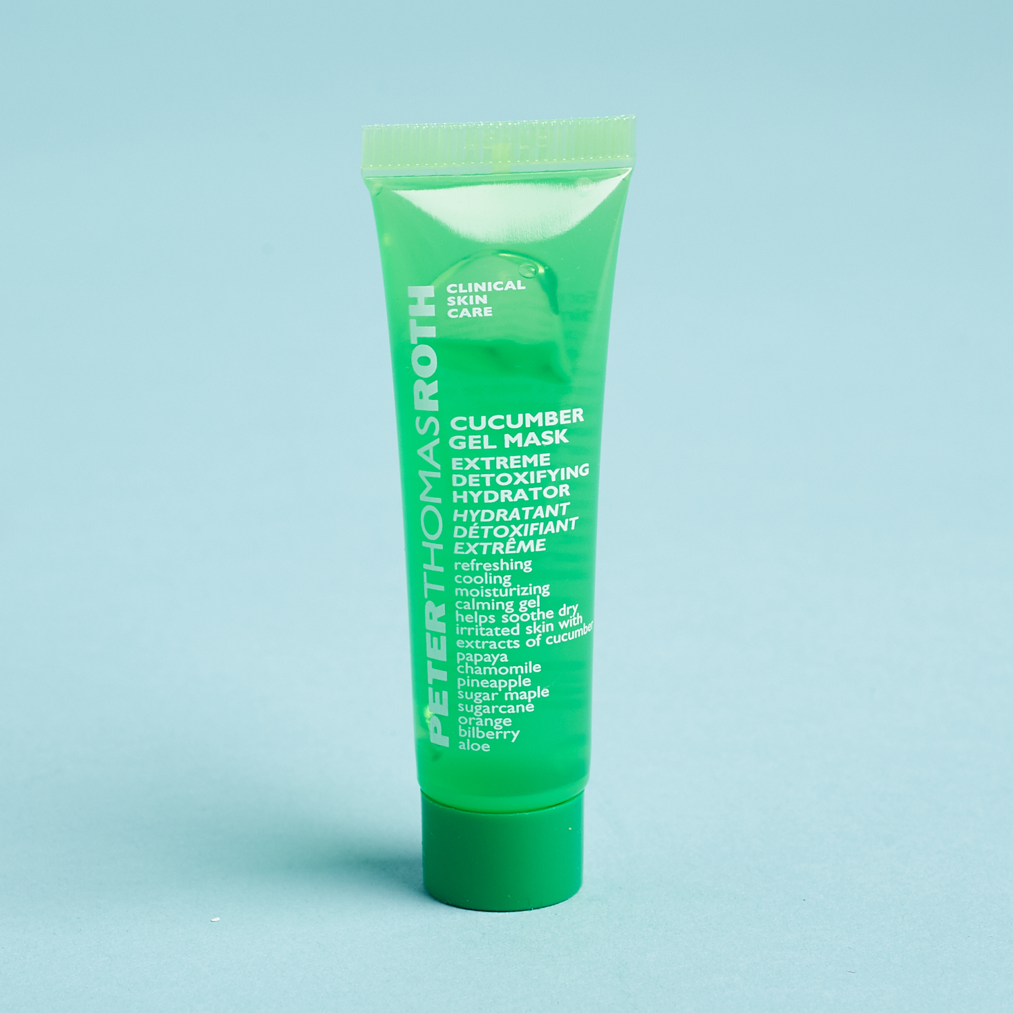 green tube with clear gel mask