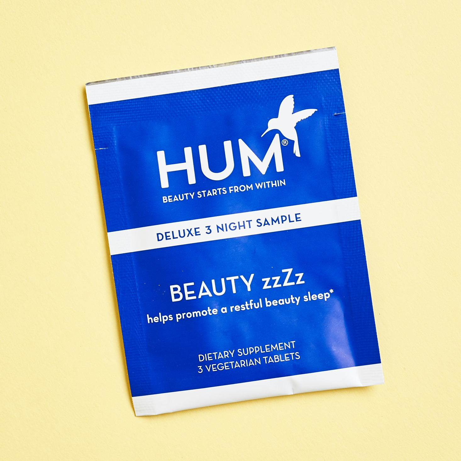 blue and white packet of HUM sleep supplements