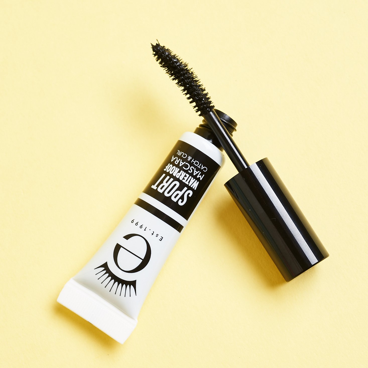 open mascara with curved brush