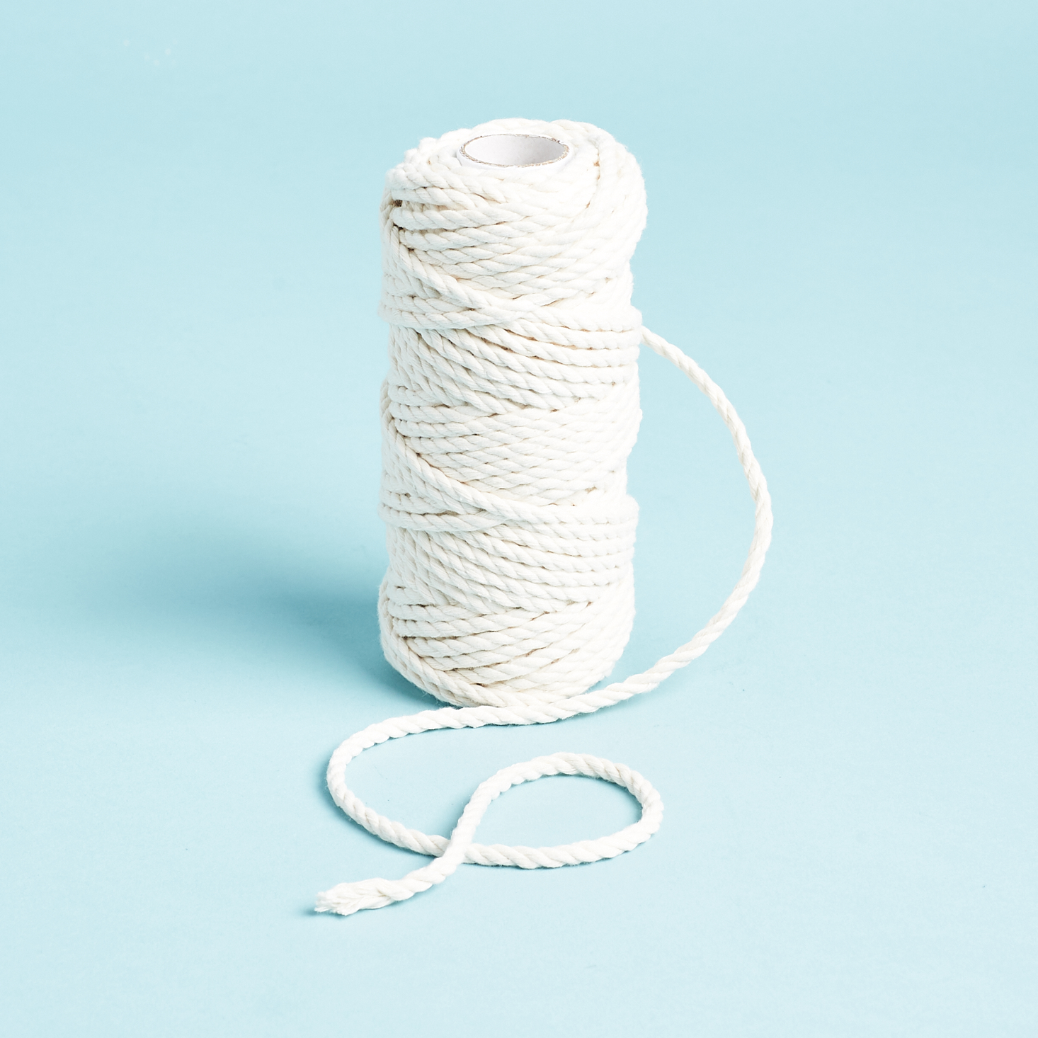 bobbin of white thick cotton cording rope