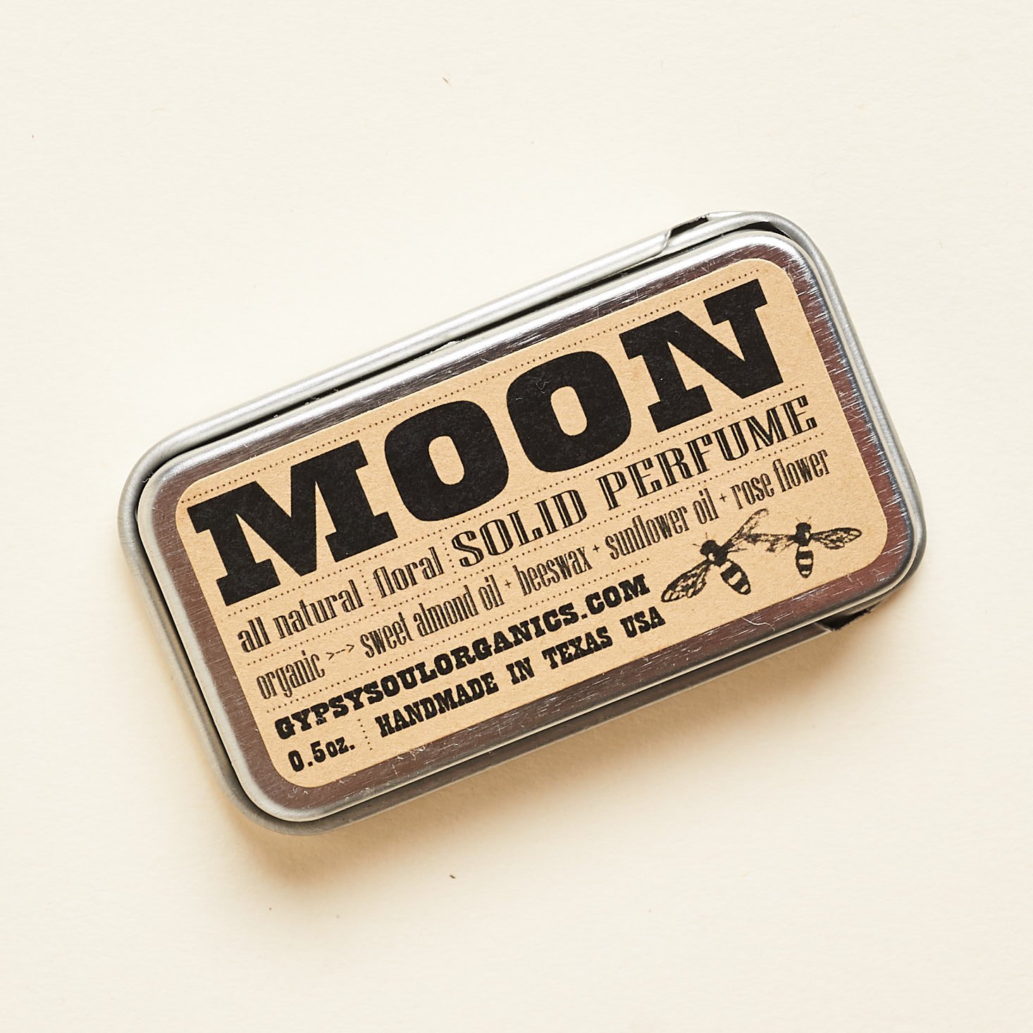 moon solid perfume in metal sliding container