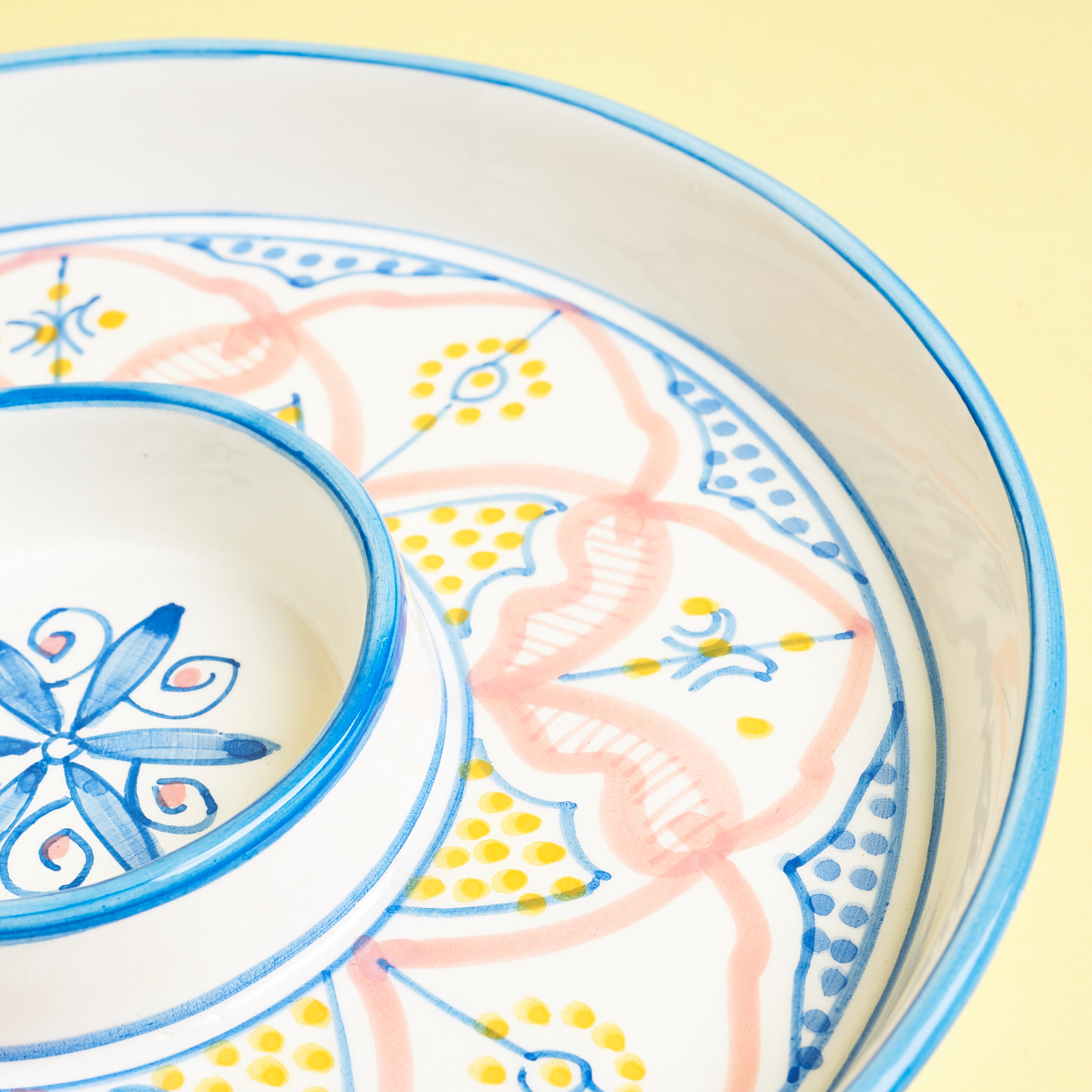 detai; shot of hand painted design on the plate