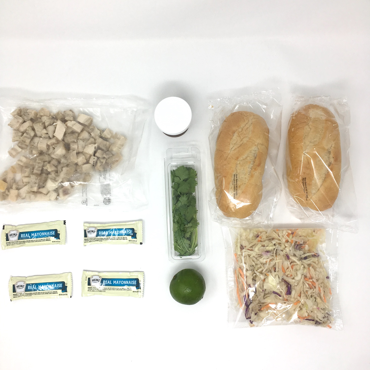 a laydown of all the korean BBQ chicken sandwich ingredients