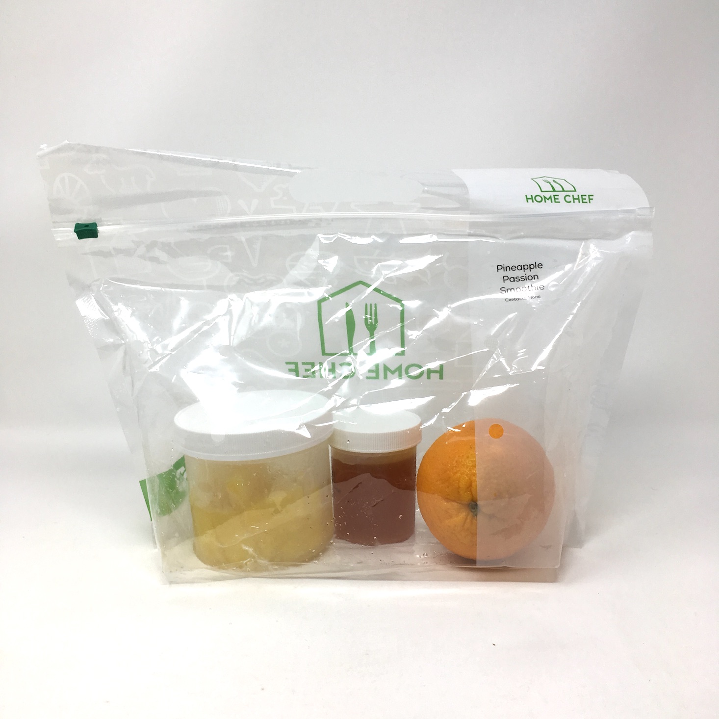 front view of the home chef ingredient bag packaging for the pineapple passion smoothie recipe