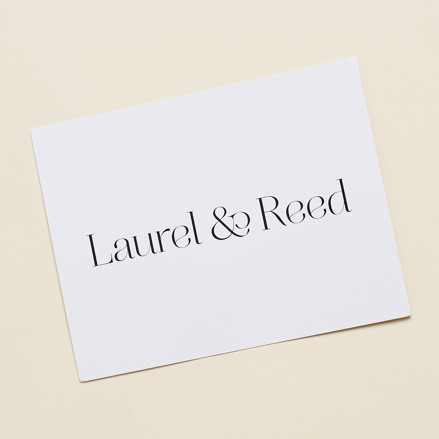 Laurel & Reed info card with company name on front