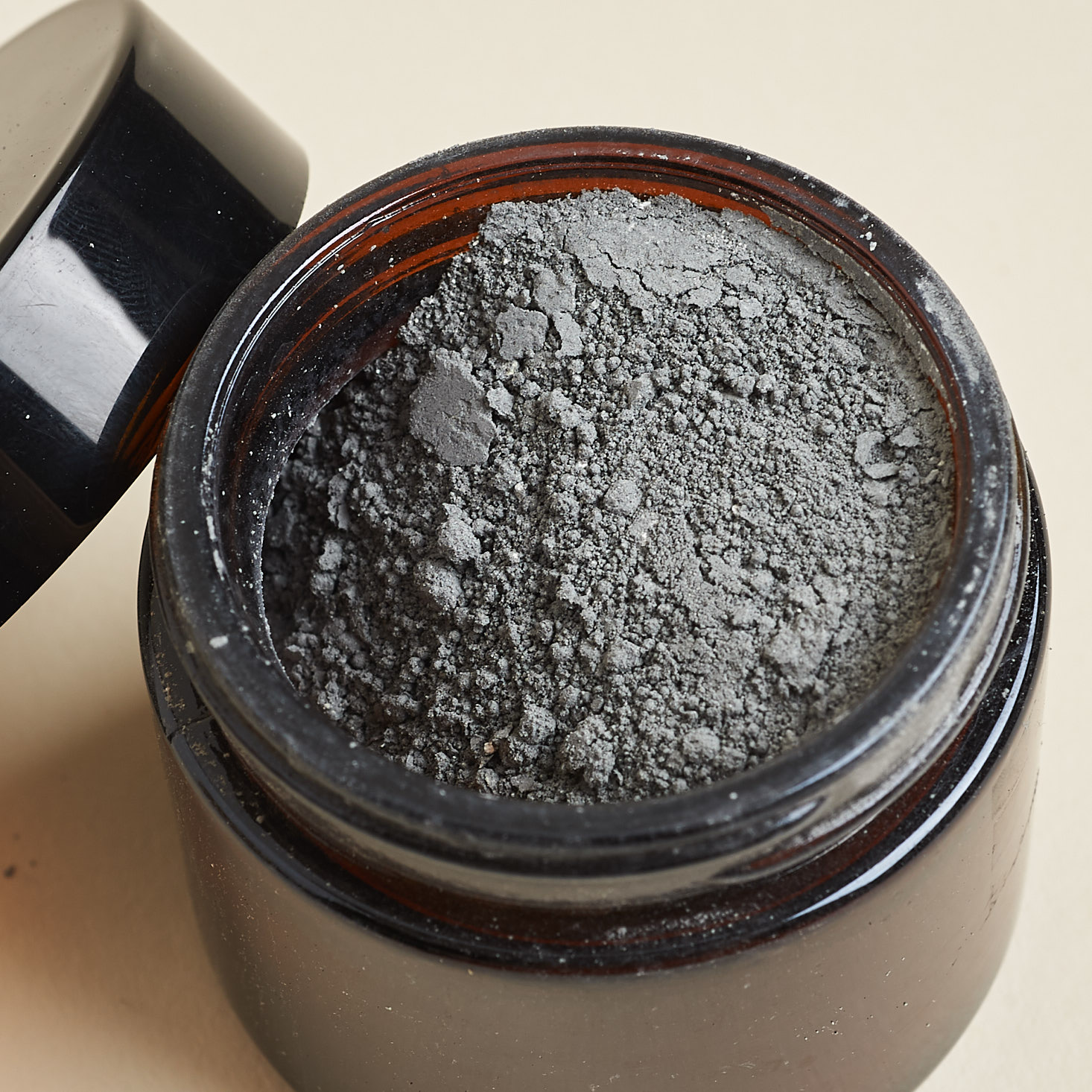 Opened Sarisha Beauty Deep Cleansing Face Mask to show grey powder