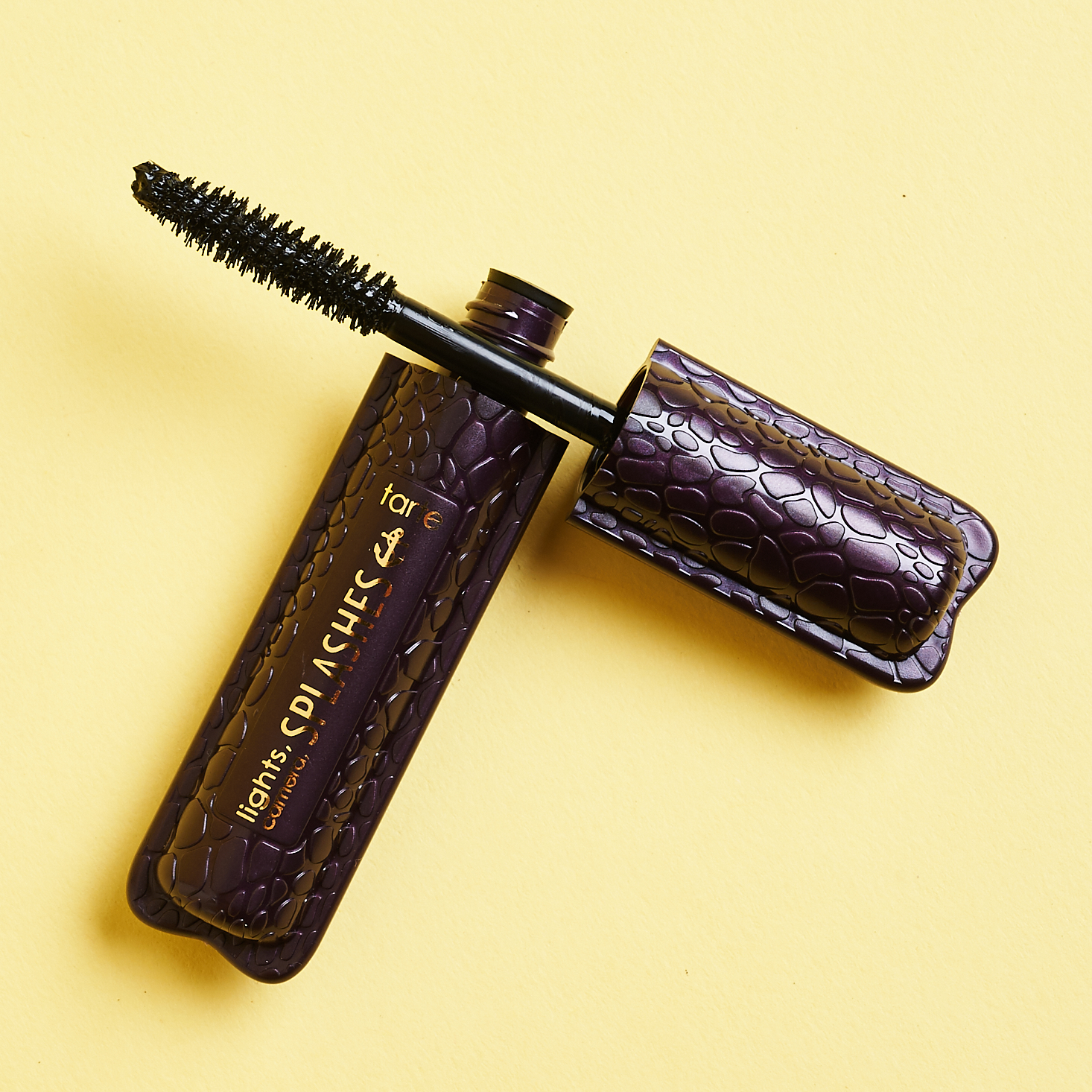 open mascara with brush bristle head showing