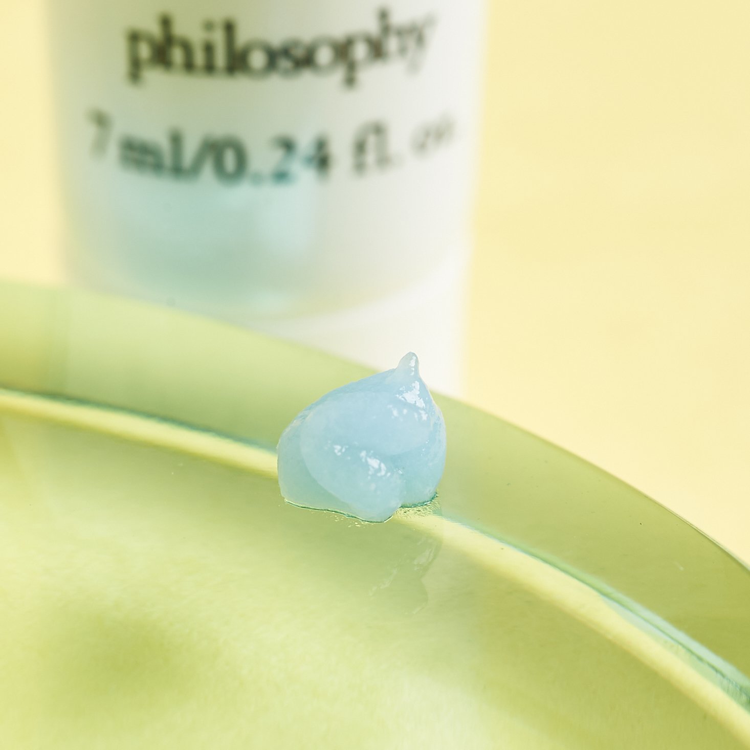 light blue color of face peel is shown on glass