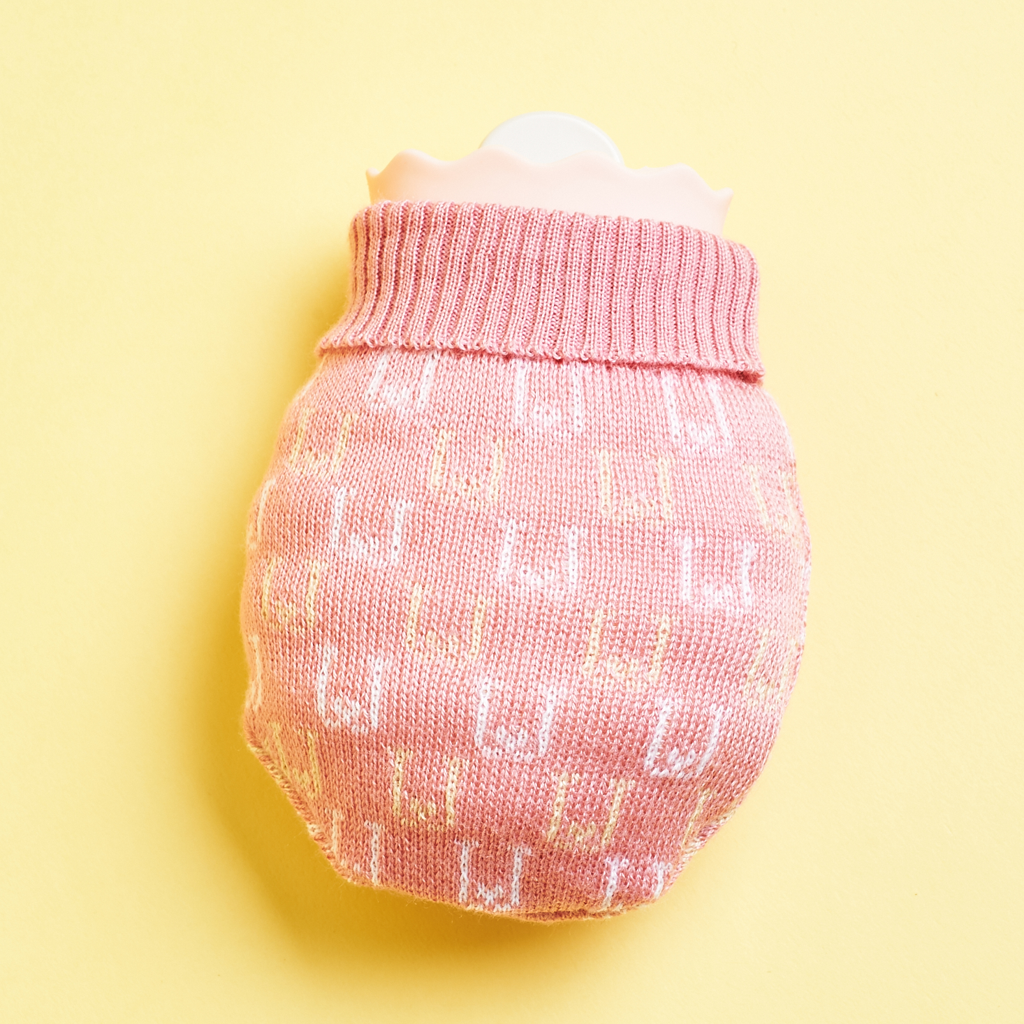 pink water bag with pink knit cover