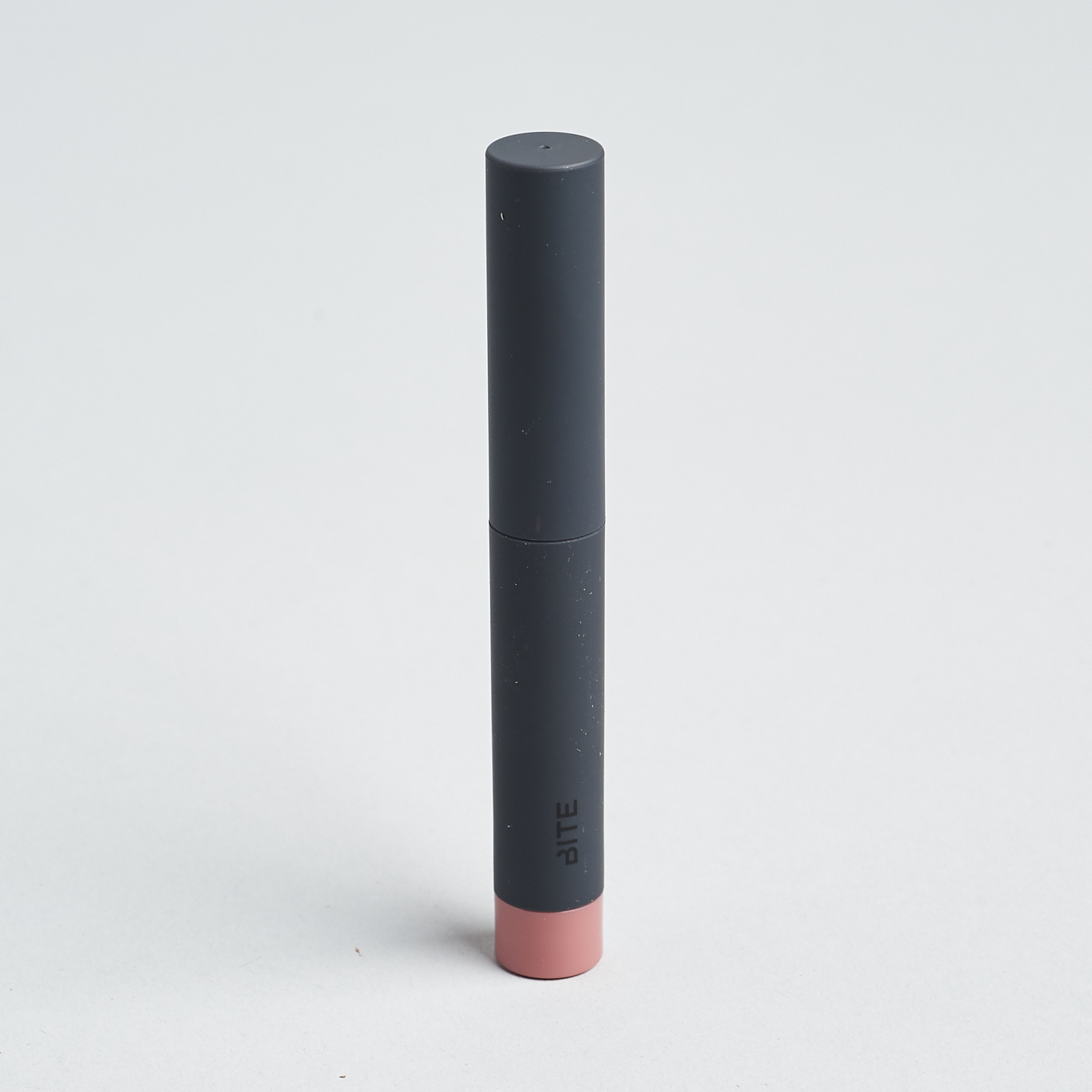 black and blush tube of lipstick pencil