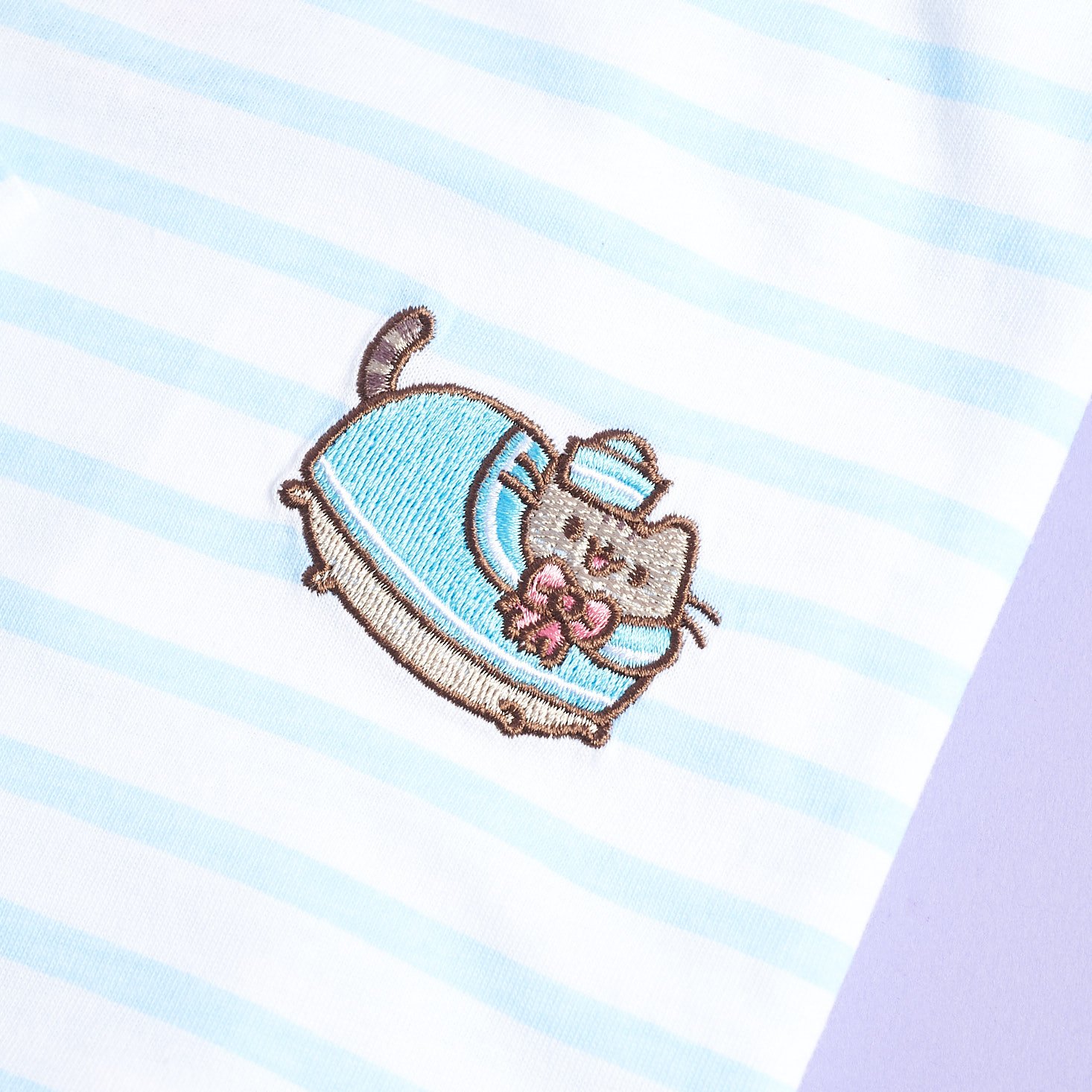 close up of embroidered Pusheen on Long sleeve striped Pusheen Sailor tee