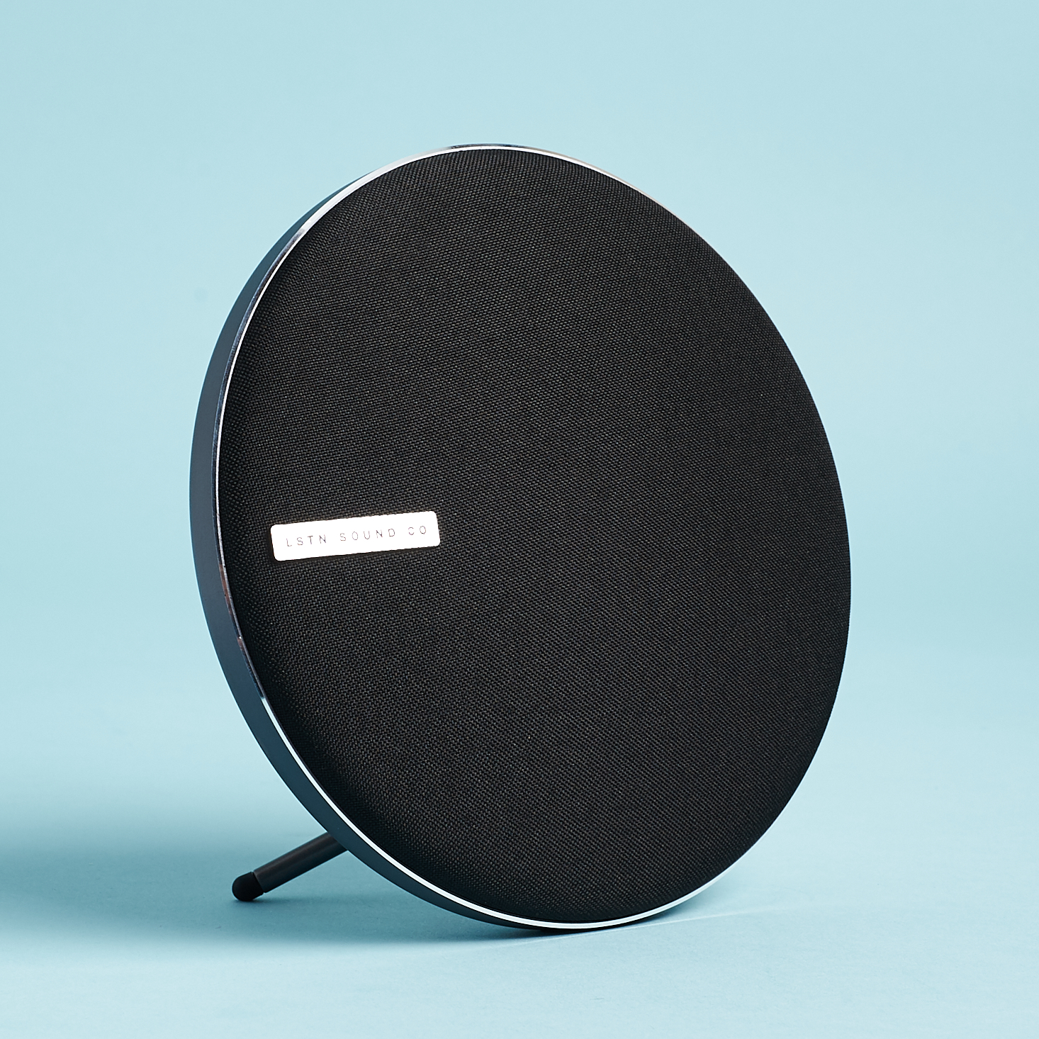 round bluetooth speaker with lean stand