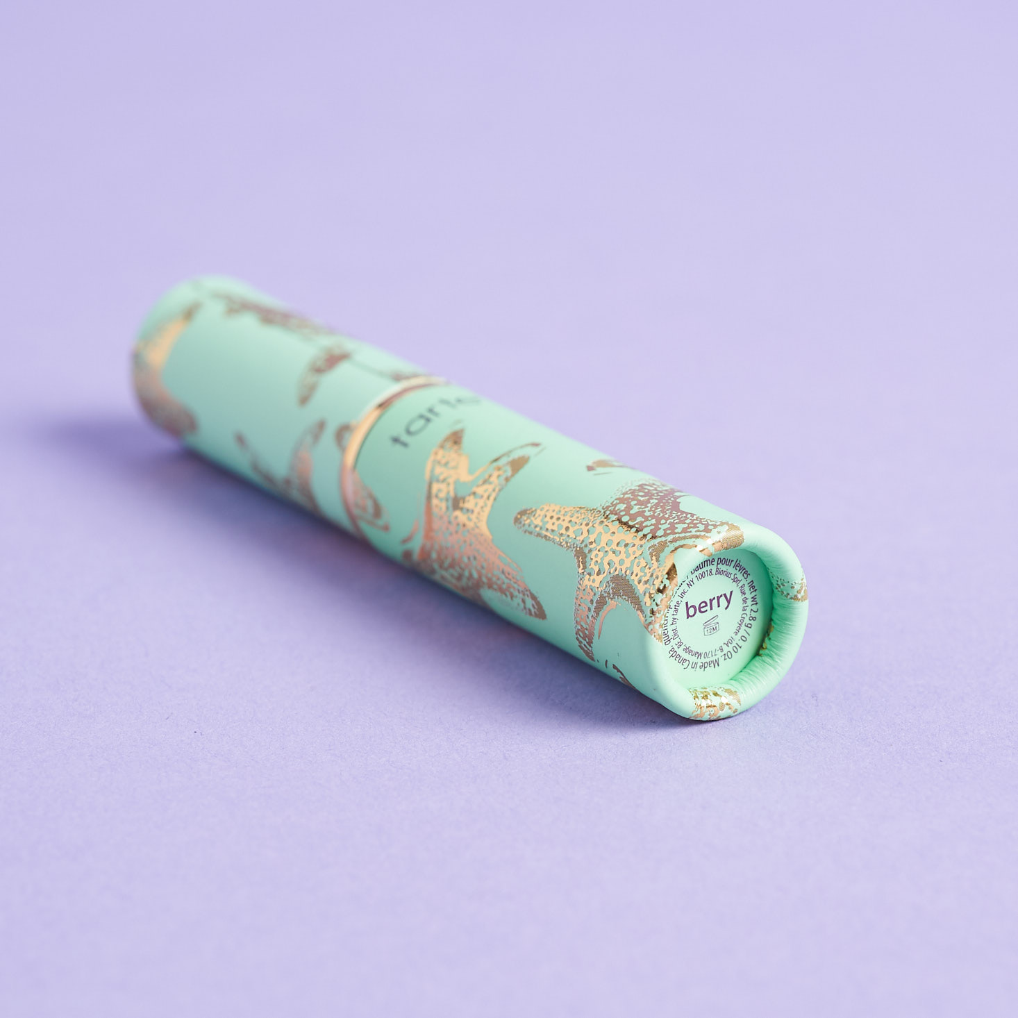 bottom of tarte Quench Lip Rescue Balm - Rainforest Of The Sea Collection in Berry