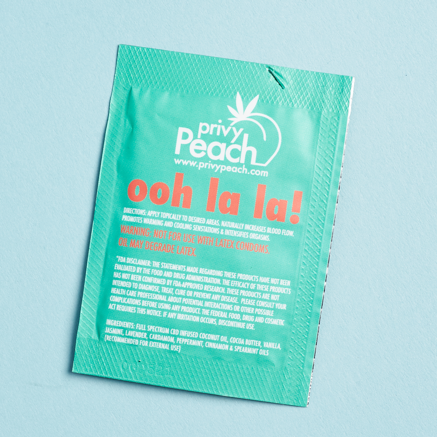 back of Privy Peach CBD infused Erotic Topical Oil packet