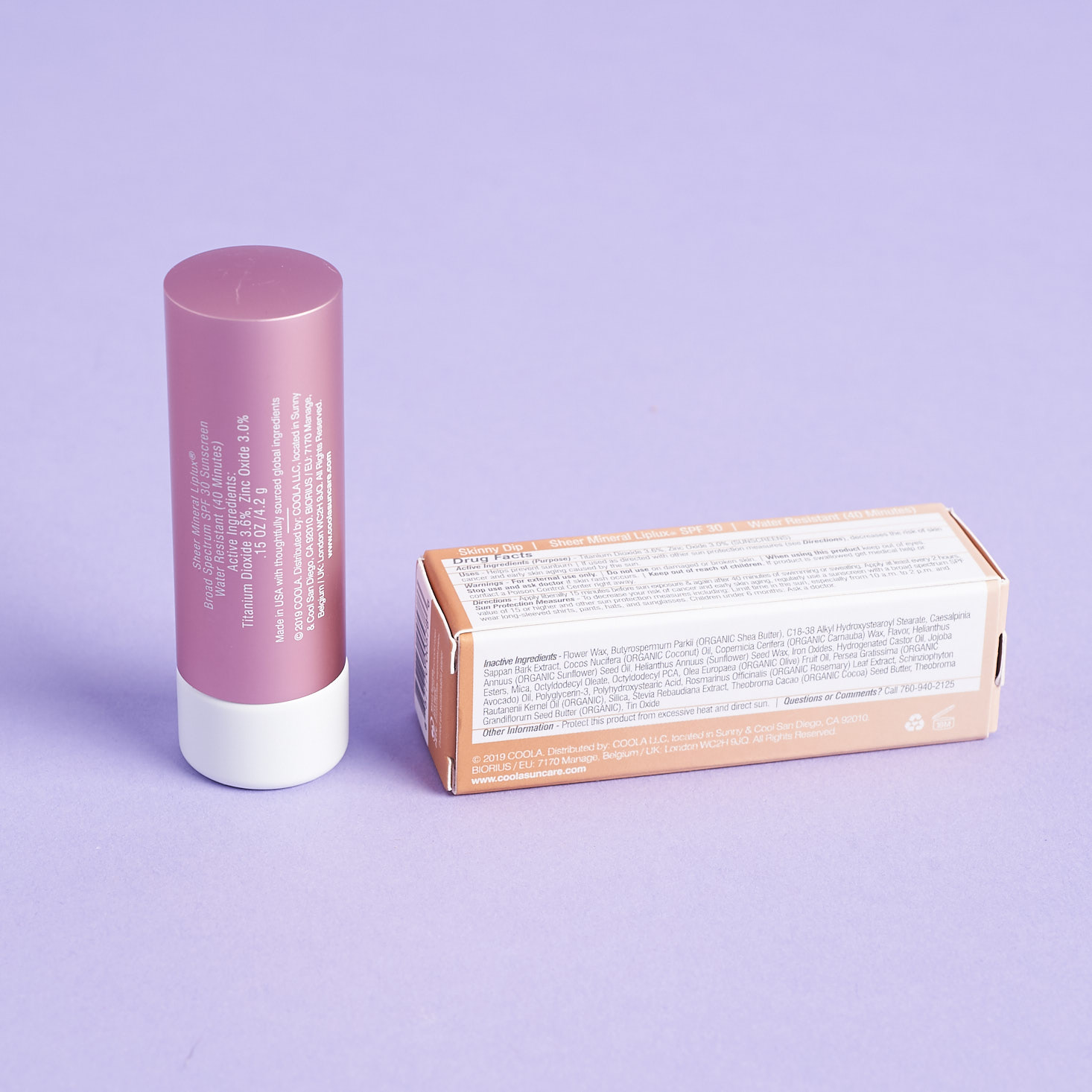 back of Coola Mineral Liplux Organic Tinted Lip Balm with box