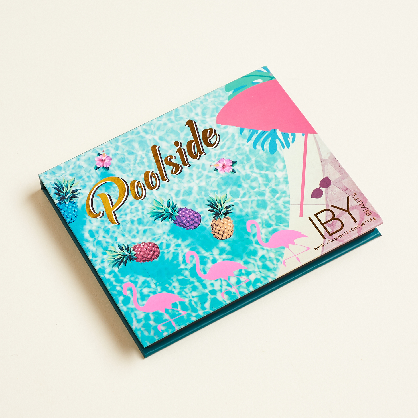 lid of the poolside palette featuring a summery pool illustration