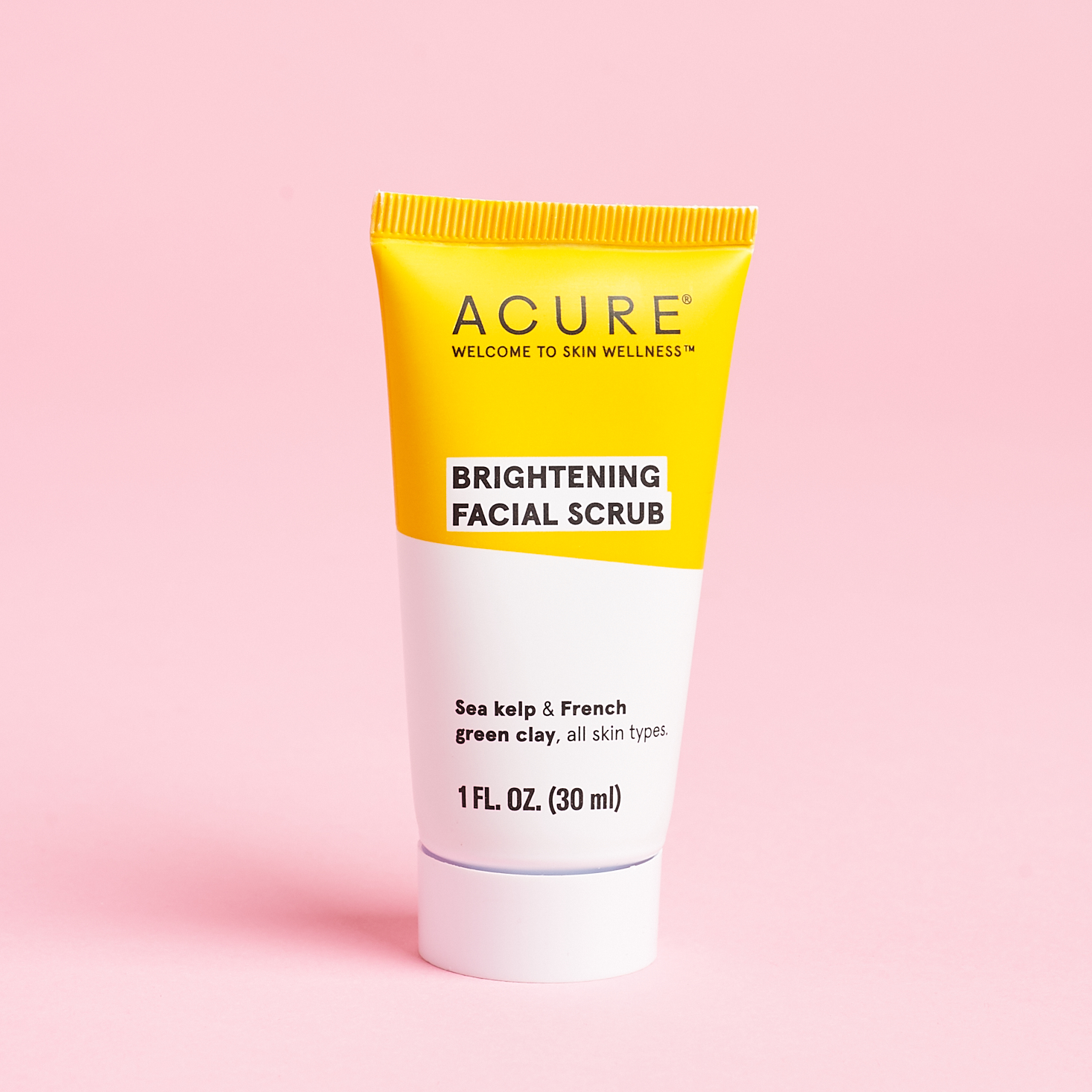 acure scrub in white and yellow tube