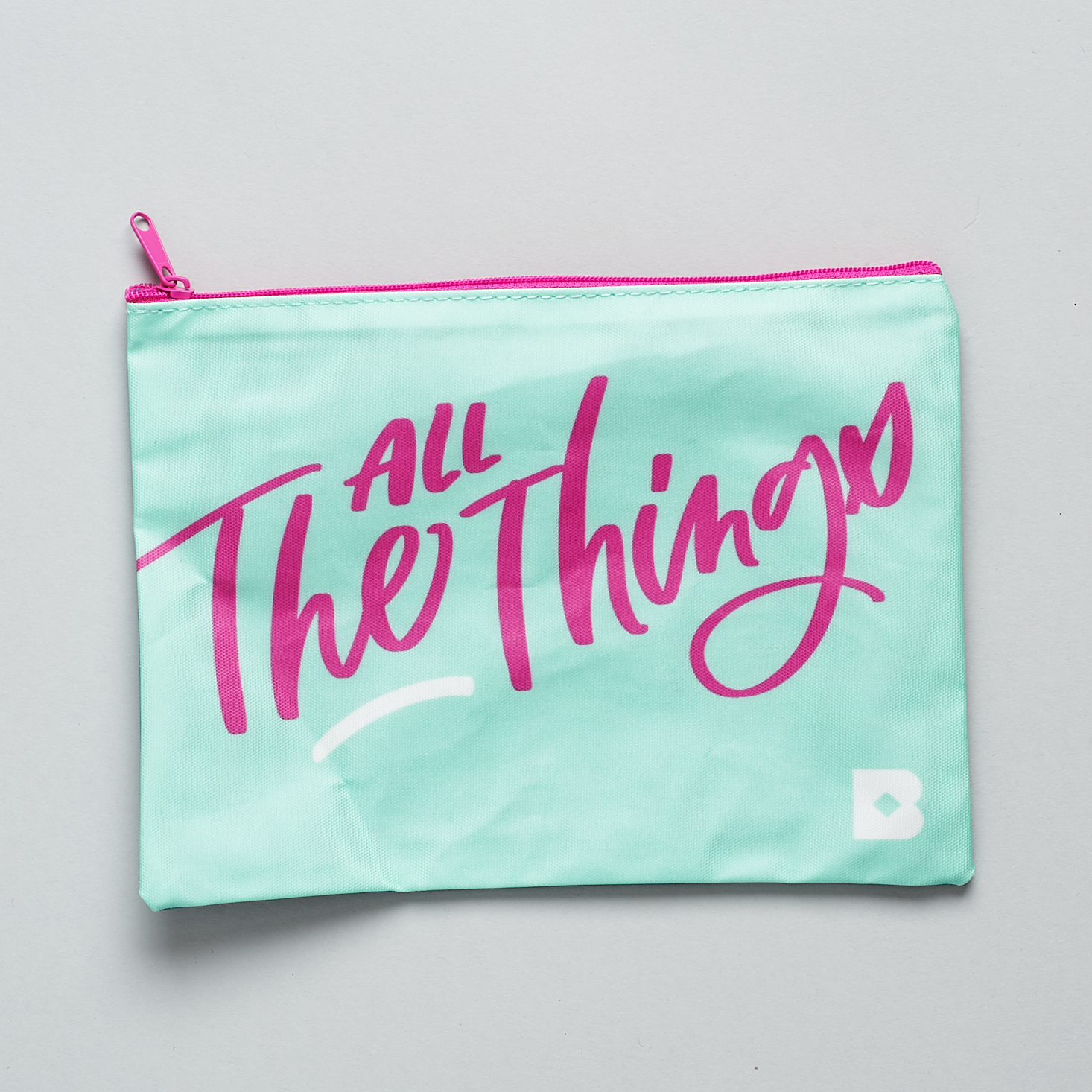 aqua and pink bag with "all the things: text on it