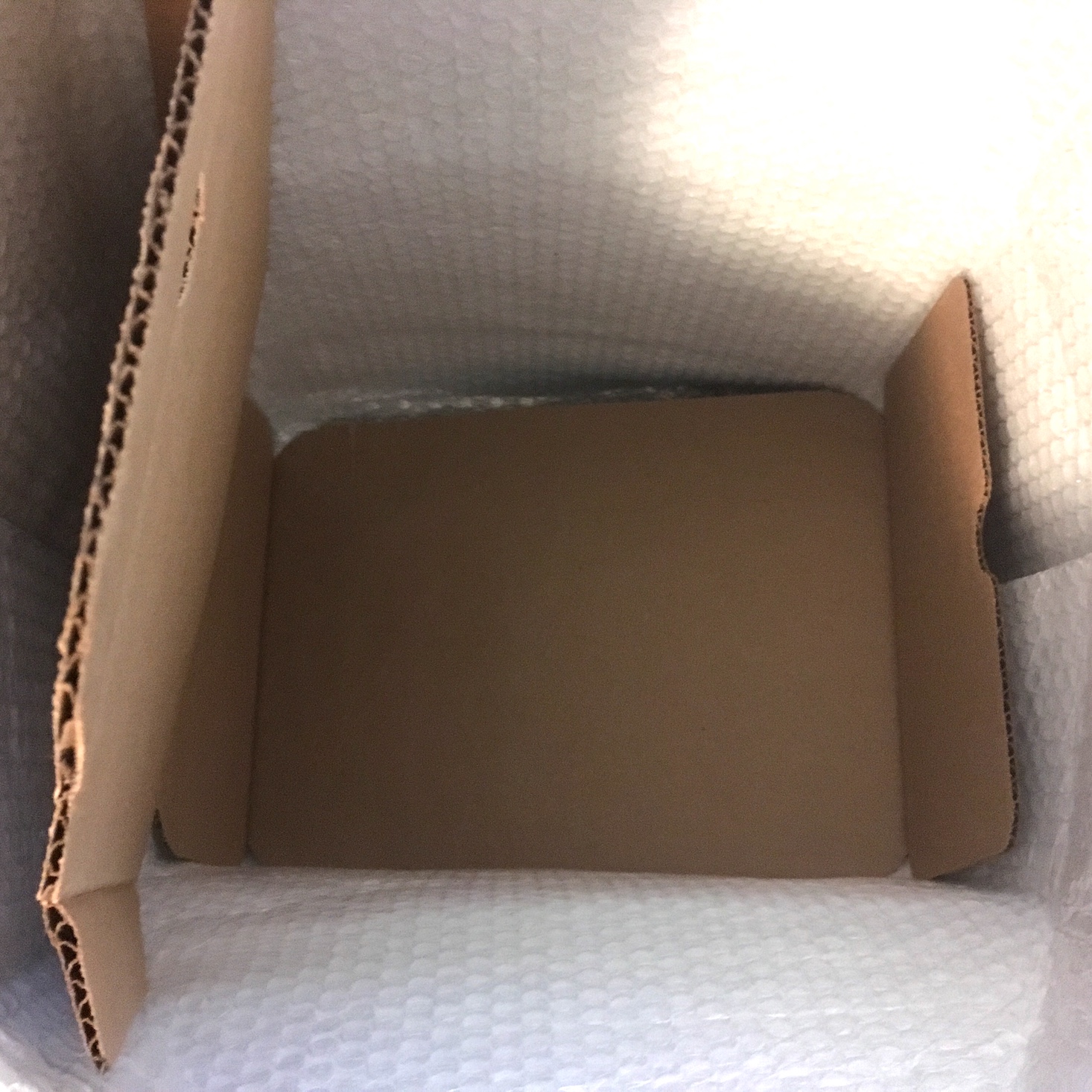 opened cardboard ingredients container