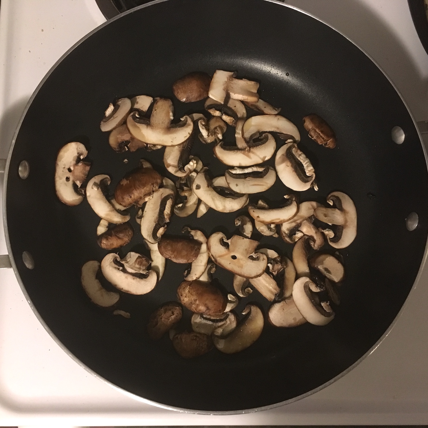 spicy egg and vegetable skillet mushrooms cooking in the pan