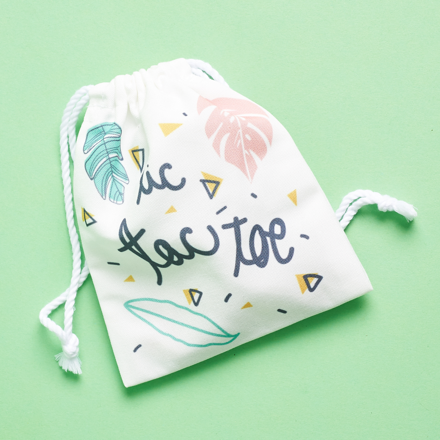 portable tick tac toe kit in drawstring pouch