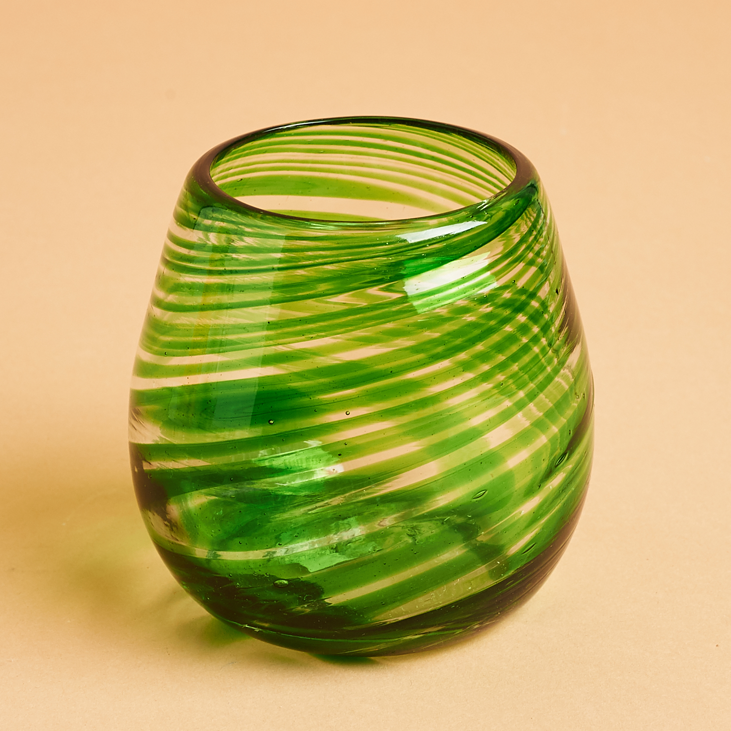 green blown stemless glass