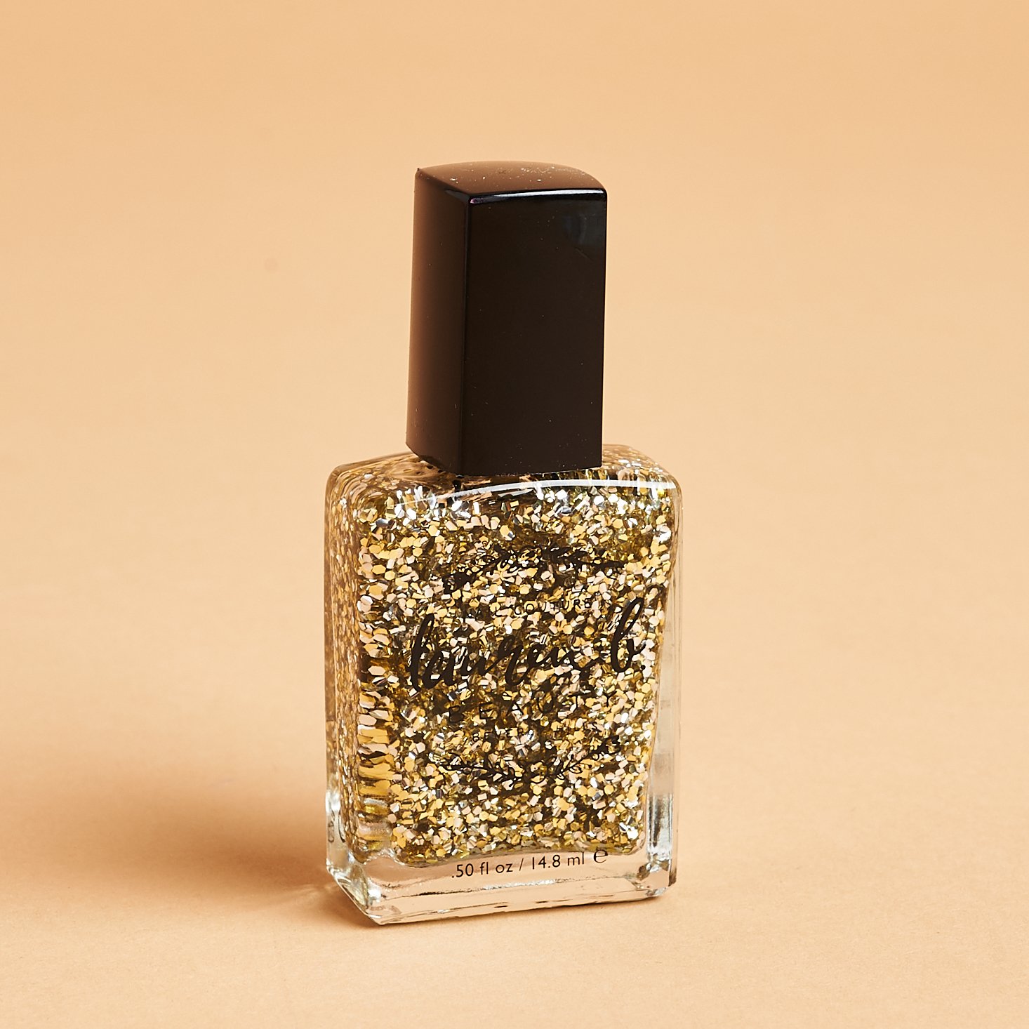 super glittery clear nail polish bottle